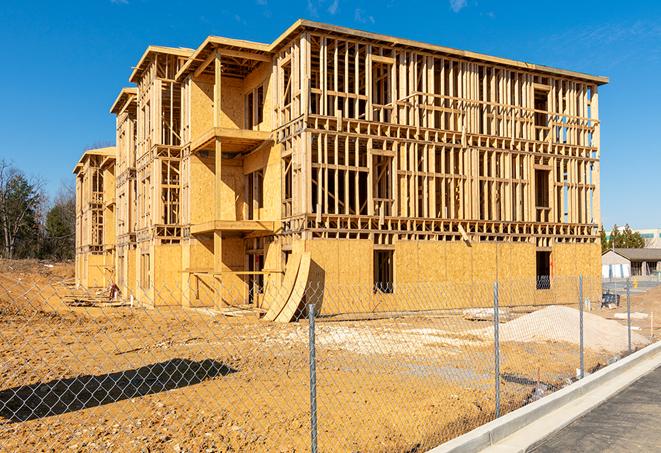 a snapshot of temporary chain link fences protecting a large construction project from unauthorized access in Elmwood Park NJ